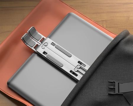 Reguliuojamas nešiojamojo kompiuterio stovas