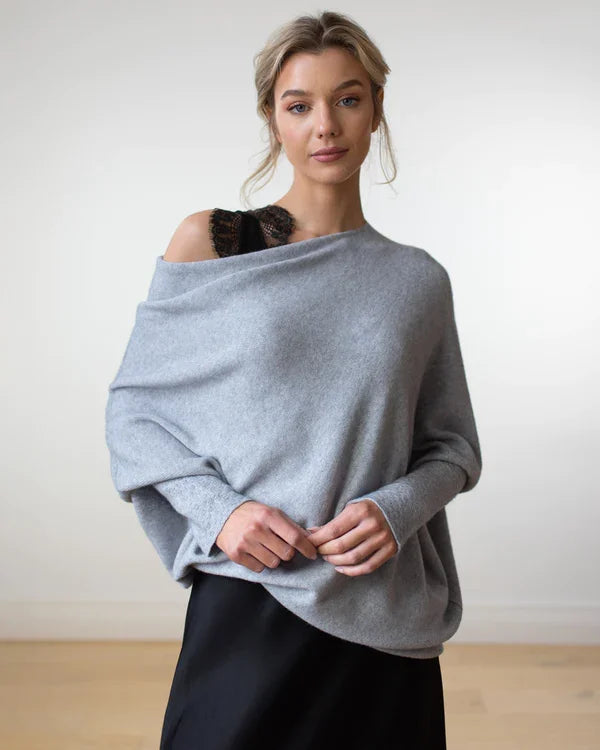 Asimetriškas megztinis moterims